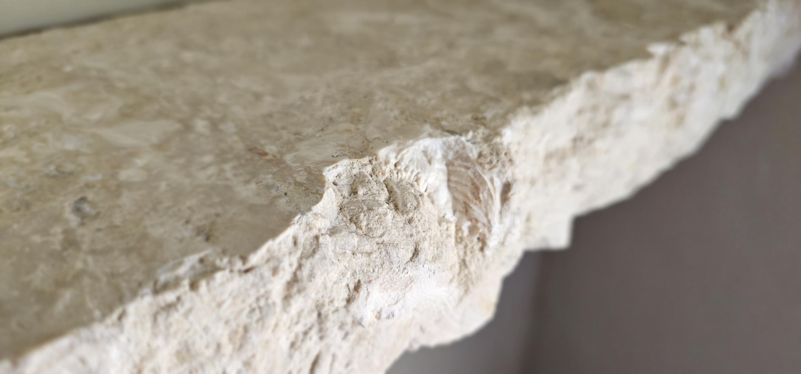 Shell Limestone Floating Shelf With Chiseled Edges. Natural Stone
