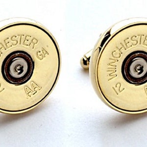 Cuff links made from 12 gauge shotgun shells