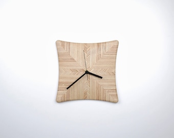 Specifically patterned plywood wall clock