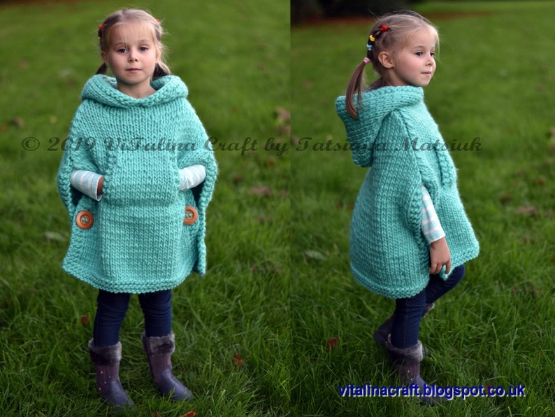 May include: A teal knitted hooded poncho with pockets and wooden buttons. The poncho is worn by a child standing in a grassy field.