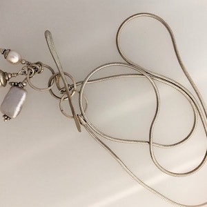 Sterling silver lariat neclace with freshwater pearls