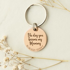 30mm rose gold engraved keyring from trashed gifts. Text reads The day you became my mummy 31.08.2023 Henry.