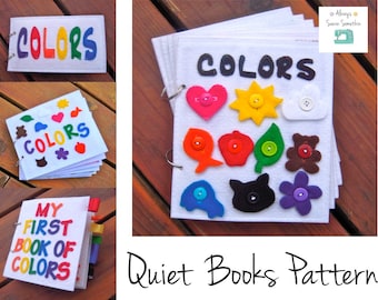 May include: A handmade quiet book pattern with the word "COLORS" in colorful felt letters. The book features felt shapes like hearts, suns, and leaves, each with a button center. The text "MY FIRST BOOK OF COLORS" is also visible.