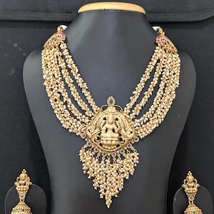 Multi stranded Pearl Chain Lakshmi Pendant Necklace Earrings Set / Heavy Kemp Haram / Haar / Indian Ethnic Jewelry / Antique Gold Plated set
