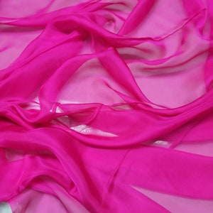 100% Silk french Chiffon Fuchsia ponk color 54" wide. Usable for Apparel and interior designing.
