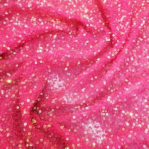 100% Silk Chiffon hand beaded sequence drapey and soft silky fabric. Usable for evening gowns tops and much more