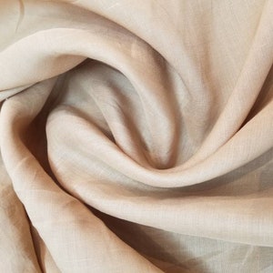 Light weight Ramie linen 54 inches wide. Usable for household furnishing and clothing. Coffee latte color