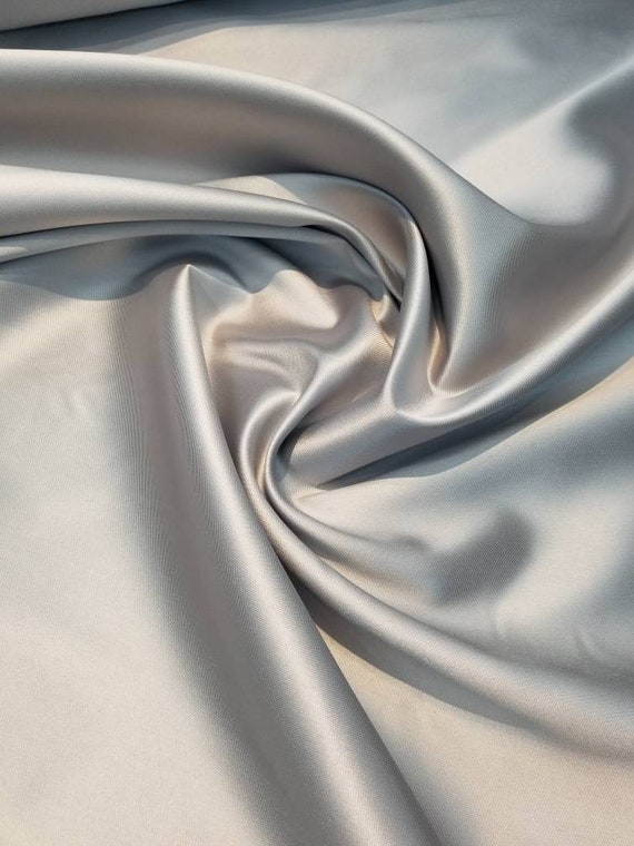 Tessuto Mikado Zibelline colore grigio argento. Il tessuto Mikado