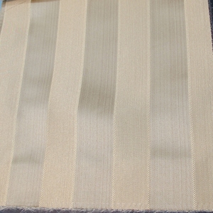 May include: Beige fabric with vertical stripes of a slightly darker beige color.