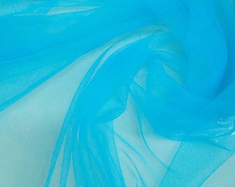Super fine soft turquoish blue color Tulle/Mesh 60" wide sold by the yard usable for Apparel and interior designing.