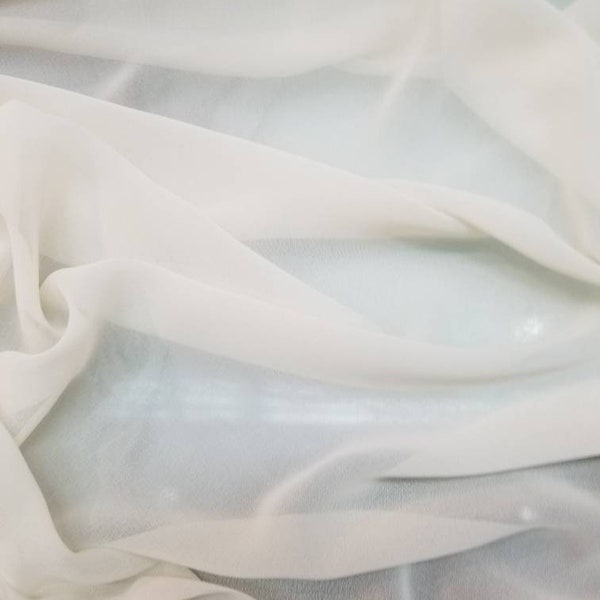 French  Chiffon off white  color   57" wide. Usable for Apparel and interior designing.