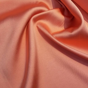 Coral  color  Mikado/Zibelline  Fabric. 60&quot; Wide Mikado Fabric is a unique blend makes this fabric soft & Gives Structure to  Dress.