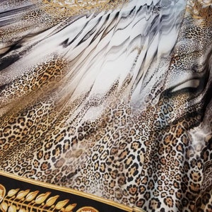Digital exotic animal Italian design printed on Charmuse fabric usable for apparel accessories and interior designs. 54&quot; wide. Animal print