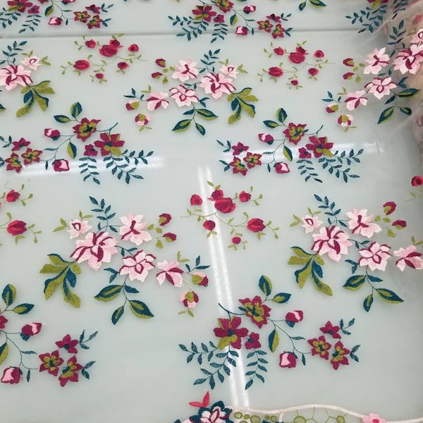 Italian designer  fabric Floral print on tulle fabric.  Price for One Yard 50" wide. Usable for apparel,accessories and interior designing .