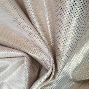 Brocade fabric Gold color  mettallic  in contemporary designer fabric. Usable for Apparel and interior designing. 45" wide.