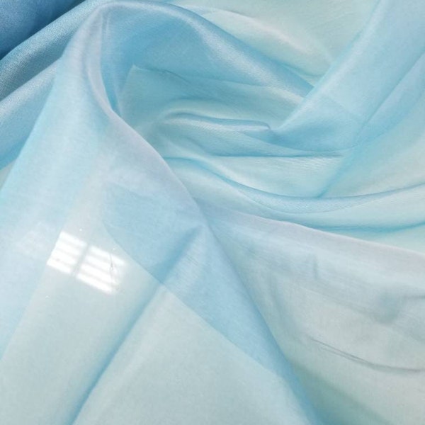 Silk organza baby blue   color 54" wide. Usable for apparel accessories and interior designs.