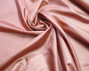 60" Polyester China Silk Lining. Sold by the Yards Minimum Order 6 Yards. Blush pink color