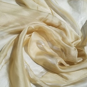 100% Silk Chiffon Gold color   54&quot; wide. Usable for Apparel,accessories,  interior designs and much more.  Soft and flowy.
