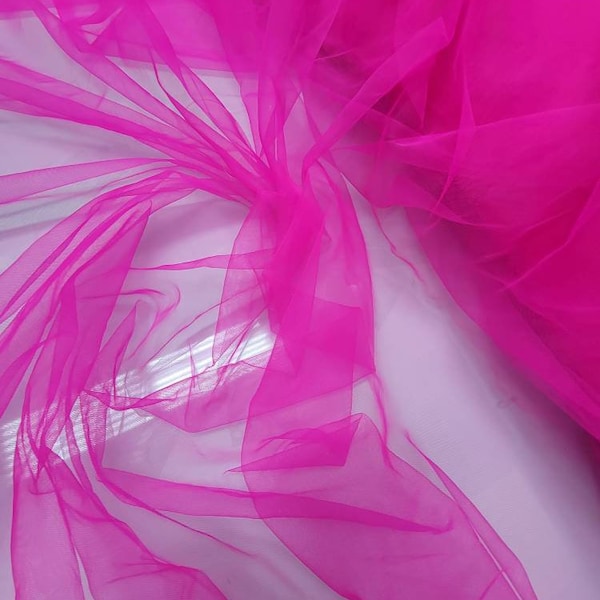 Super fine soft fuschia pink color Tulle/Mesh 60" wide sold by the yard usable for Apparel and interior designing.