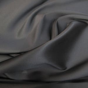 Black Poly Mikado/Zibelline  Fabric. 60&quot; Wide Mikado Fabric is a unique blend makes this fabric soft & Gives Structure to  Dress.