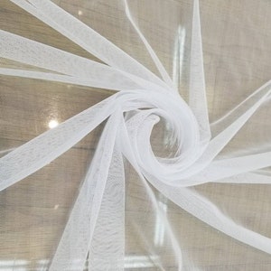Super fine soft white  color Tulle/Mesh 60&quot; wide sold by the yard usable for Apparel and interior designing.