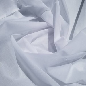 White color Mercerised 100% soft Cotton Voile fabric usable for apparel,accessories and interior designing 45 inches wide.