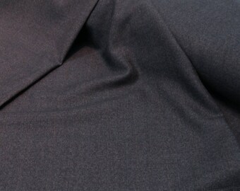 Tela para traje a cuadros de lana gris de 60" de ancho. Es una tela a cuadros importada y liviana para traje.