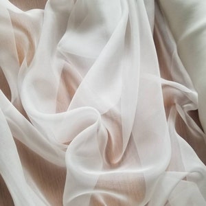 100% Silk Chiffon off white  45" wide. Usable for Apparel and interior designing.