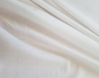 Off White color Mercerised 100% soft Cotton Voile fabric usable for apparel,accessories and interior designing 45 inches wide.