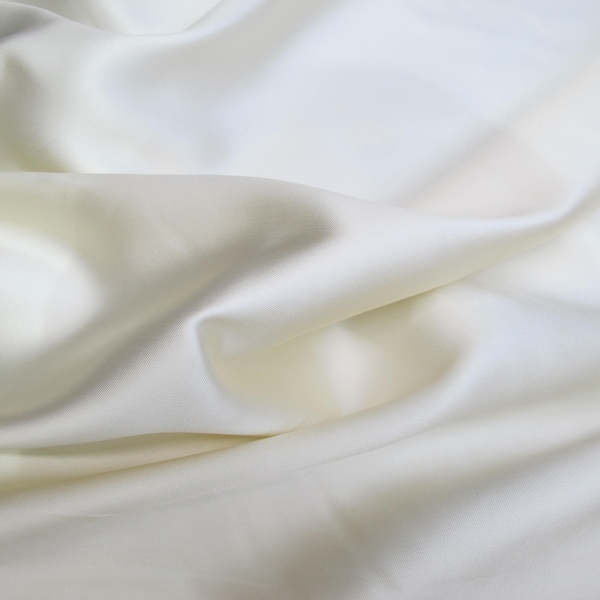 Ivory  Poly Mikado/Zibelline  Fabric. 60" Wide Mikado Fabric is a unique blend makes this fabric soft & Gives Structure to  Dress.