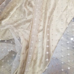 Hand beaded Gold fabric.   This gorgeous sheer dress Fabric creating a very detailed design. This piece is absolutely stunning and  Perfect