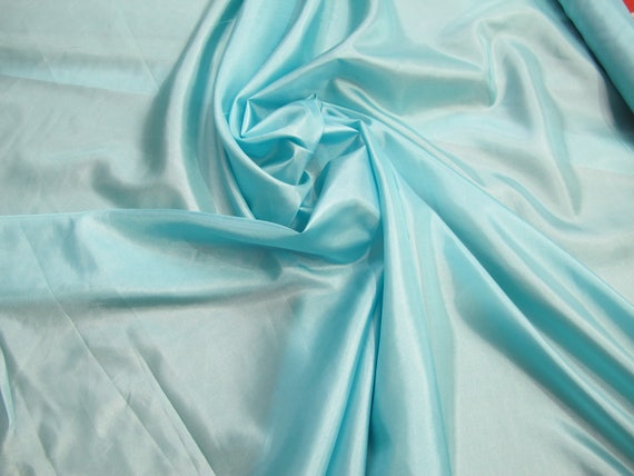 Turquoishcolor " Polyester China Silk Lining usable for apparel accessories and interior designing.