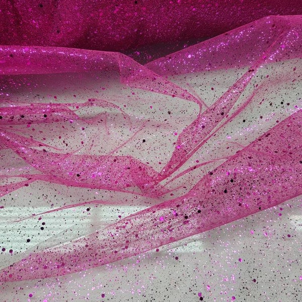 Glitter sparkle tulle usable for apparel accessories interior designs  dancing costumes. 60" wide Fuchsia base with fuschia sparkle  glitter