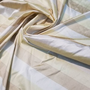 100% Silk taffeta stripe beautifully made for  drapery, decorations and for apparel use. 54&quot; wide.