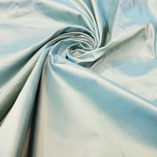 100% Silk Taffeta Sage green color  is a crisper, finely woven, medium weight silk fabric. 54" wide usable for apparel and   home decor.