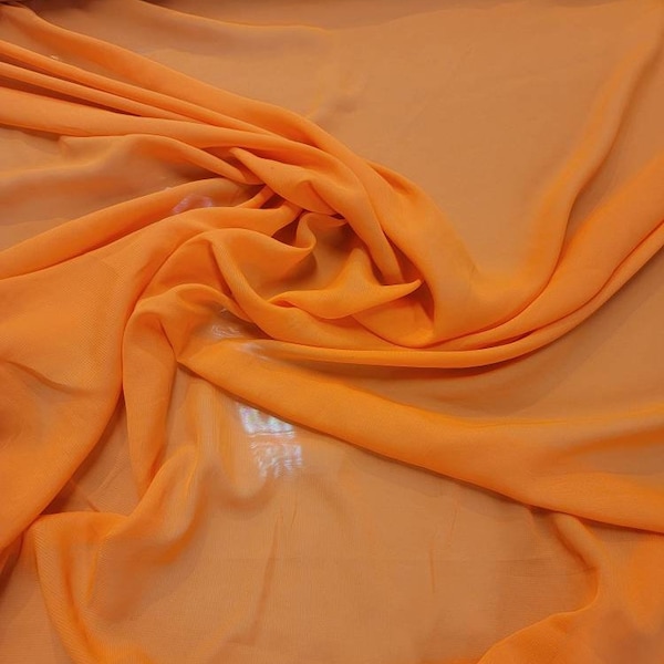 Orange  color Chiffon  54" wide. Usable for Apparel and interior designing.