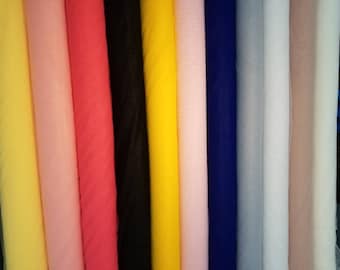 Super fine soft quality shiny tulle 60&quot; wide. Usable for apparel accessories and interior designing. Soft drapey and see thru exotic fabric