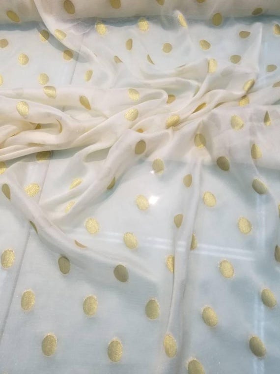 Polka dots mettalic mettalic mettalic points sur tissu mousseline de soie beige. Utilisable pour les vêtements et la conception intérieure. 45 Polka dots mettalic mettalic mettalic points sur tissu mousseline de soie beige. Utilisable pour les vêtements et la conception intérieure. 45