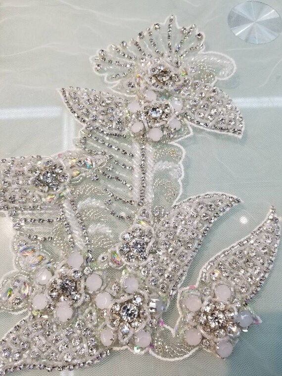Crystal Rhinestones and bead work silver combinations applique usable for bridal wear. Hand made clear beads sequence and crystal work patch
