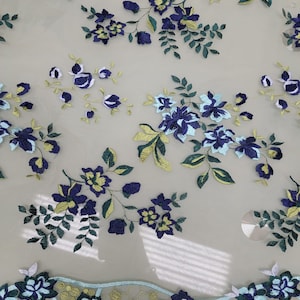 Italian designer  fabric Floral print on tulle fabric.  Price for One Yard 50&quot; wide. Usable for apparel,accessories and interior designing .