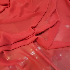 Red color Chiffon  54&quot; wide. Usable for Apparel and interior designing.