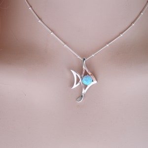 Sky Blue Lab Opal Sterling Silver Fish Pendant on Model