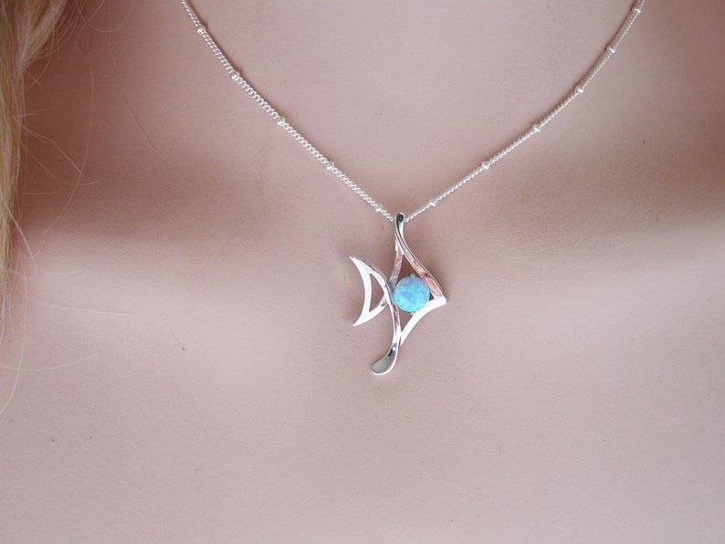 Sky Blue Lab Opal Sterling Silver Fish Pendant on Model