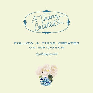 Op de afbeelding: Een blauwe en witte porseleinen vaas met een bloemenmotief, gevuld met witte pioenrozen. De tekst "A Thing Created" is geschreven in blauwe cursieve letters in een decoratief ovaal frame. Onder het frame staat de tekst "FOLLOW A THING CREATED ON INSTAGRAM @athingcreated" in blauw.