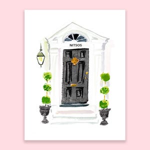 May include: Watercolor illustration of a black front door with the word "NITSOS" above it. The door is framed by white trim and flanked by green topiary plants in decorative urns. A vintage-style lantern hangs to the left.