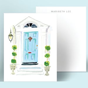 May include: A watercolor painting of a blue front door with a white frame and a white doormat. There are two potted plants on either side of the door.