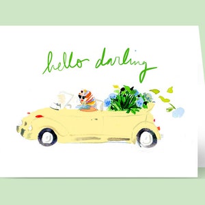 May include: A yellow car with a bouquet of blue and green flowers in the back. The car has a green "hello darling" message on the front.