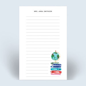 May include: A white notepad with lined paper and the text "MRS. ANNA SMITHSON" at the top. The notepad has a globe and stack of colorful books at the bottom.
