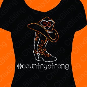May include: Black t-shirt with a rhinestone design of a cowboy boot and hat with the text "#countrystrong".