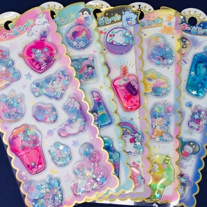 PLUS d'autocollants remplis d'eau, de confettis et de paillettes !